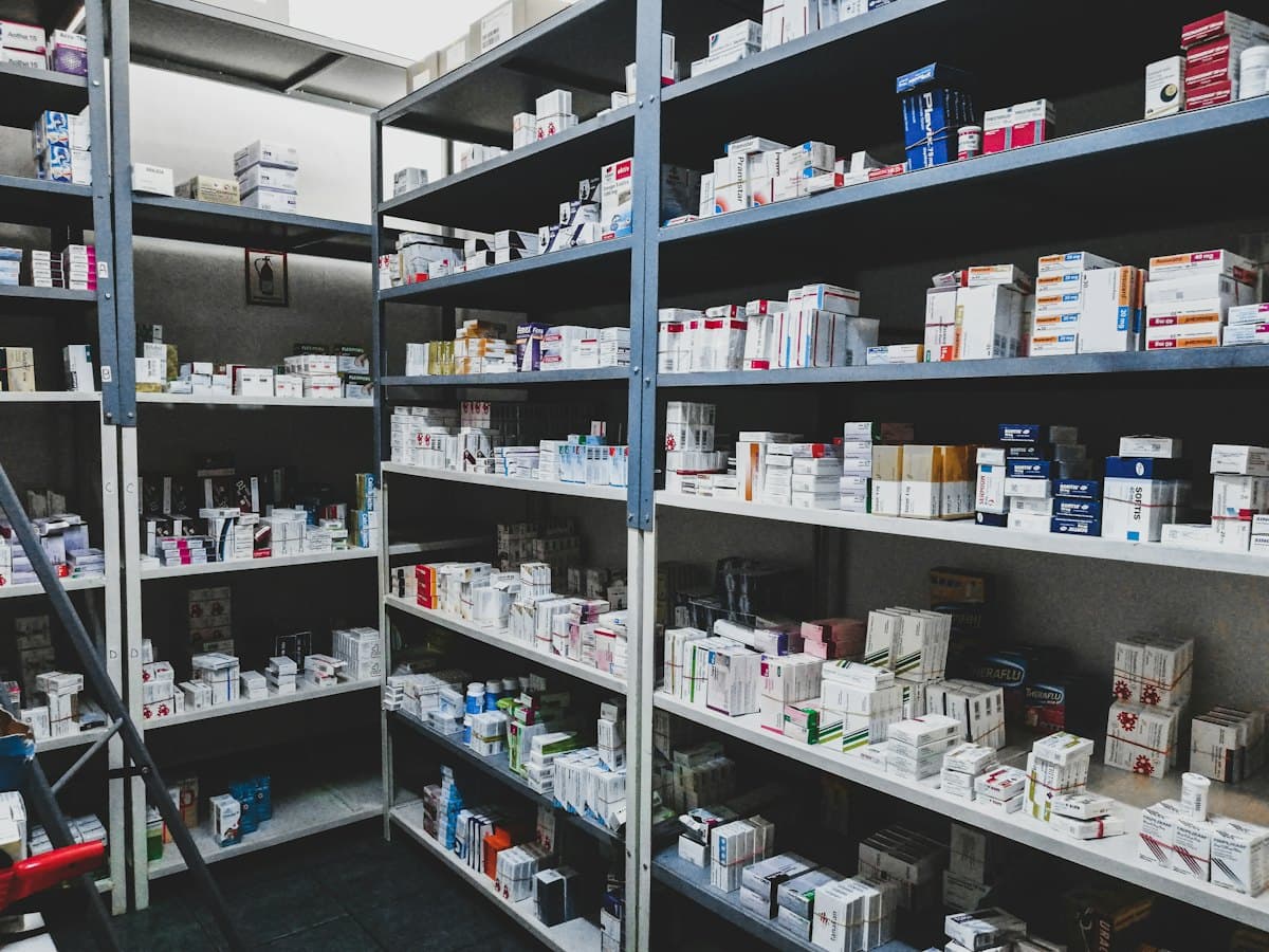Shelves of medicine boxes in a pharmacy store room